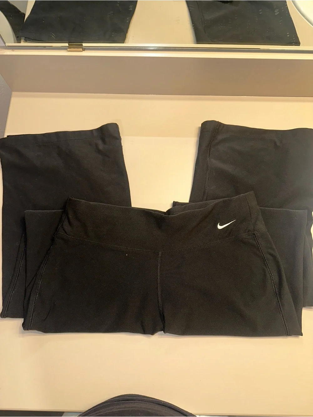Nike Kids Black Athletic Leggings with White Swoosh
